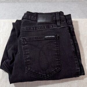 Calvin Klein women’s size‎ 29 black high rise skinny jeans.